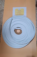 Empaque perfil doble Aleta rollo blanco apróximadamente  8 Mts.